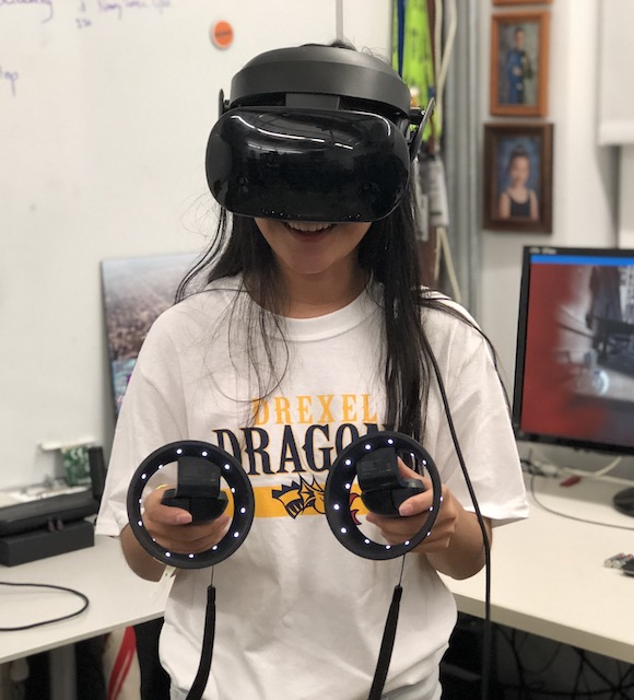 A student demos a virtual reality headset